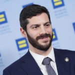 Anthropic-funded group backs candidate attacked by rival AI super PAC